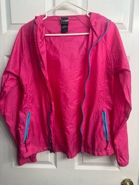 The North Face Hot Pink Hooded Windbreaker with Blue Zippers